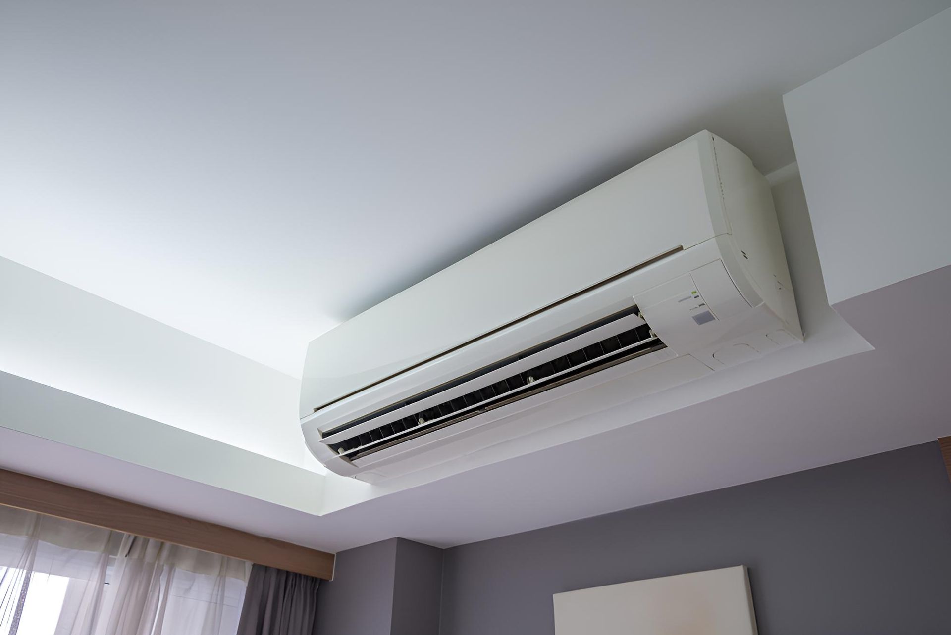 White Air Conditioner is Hanging — Robbie McDonald Electrical in Caloundra, QLD