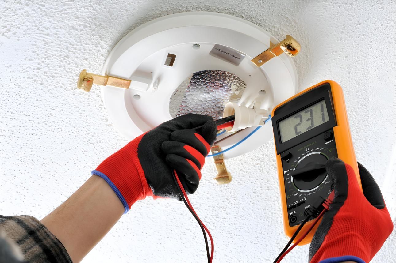 Using a Digital Multimeter to Test a Light Bulb — Robbie McDonald Electrical in Sippy Downs, QLD