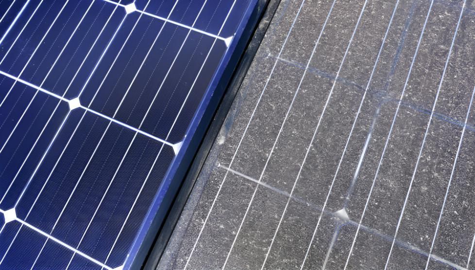 Close Up of Two Solar Panels on a Roof — Robbie McDonald Electrical in Little Mountain, QLD