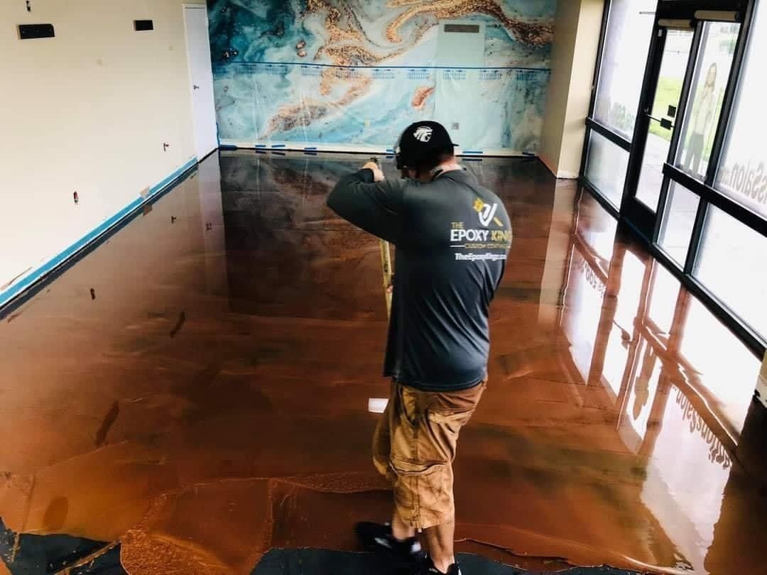Metallic epoxy flooring in Fort Myers with custom pigments and glitter finish.