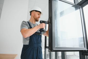 Windows Screen BC doing a window screen replacement to a large window