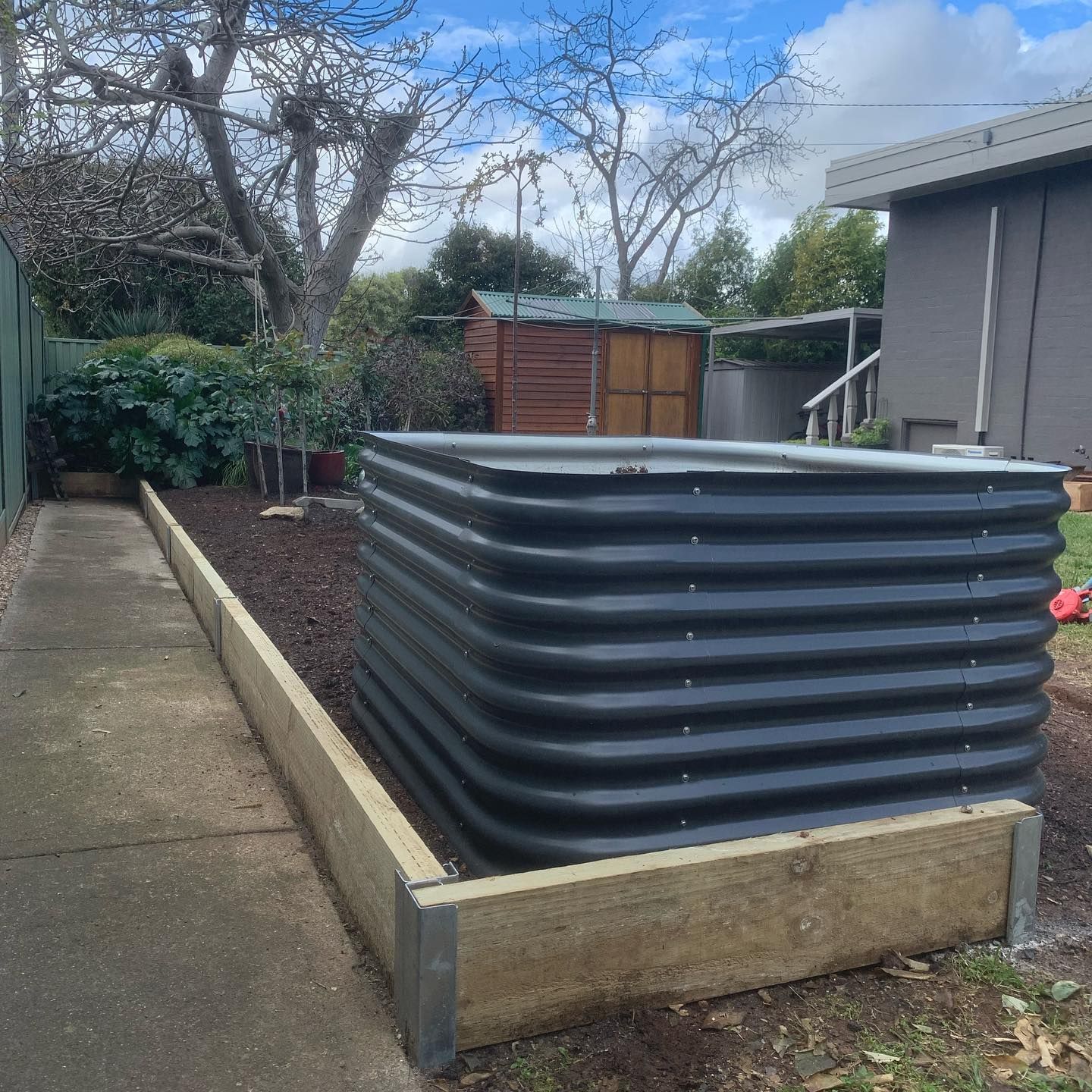 Wooden Retaining Wall — CLF Landscaping In Hawker, ACT