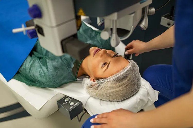 Woman having lasik eye surgery Woman having lasik eye surgery