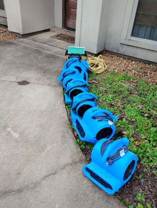 Professional drying tools outside of a central Louisiana home