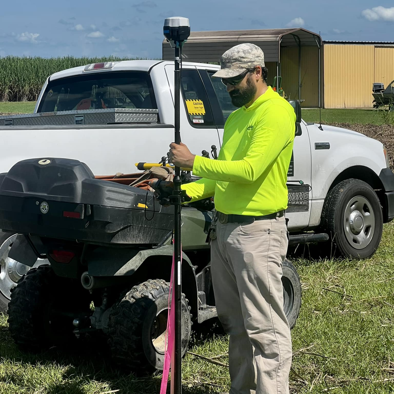man surveying a land