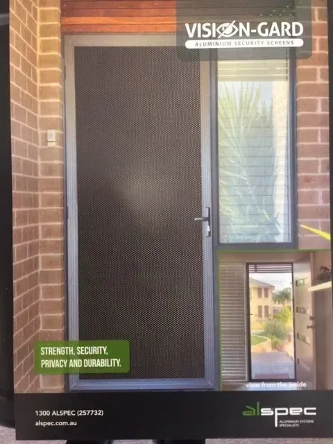 A Picture Of A Door With Vision Gard Written On It — Spring Crest Blinds, Awnings & Security Doors in Golden Square, VIC