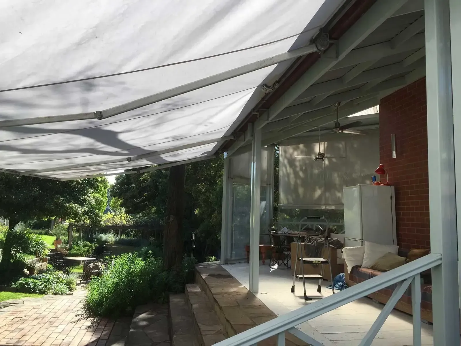 A Porch With A White Awning Over It — Spring Crest Blinds, Awnings & Security Doors in Ballarat, VIC