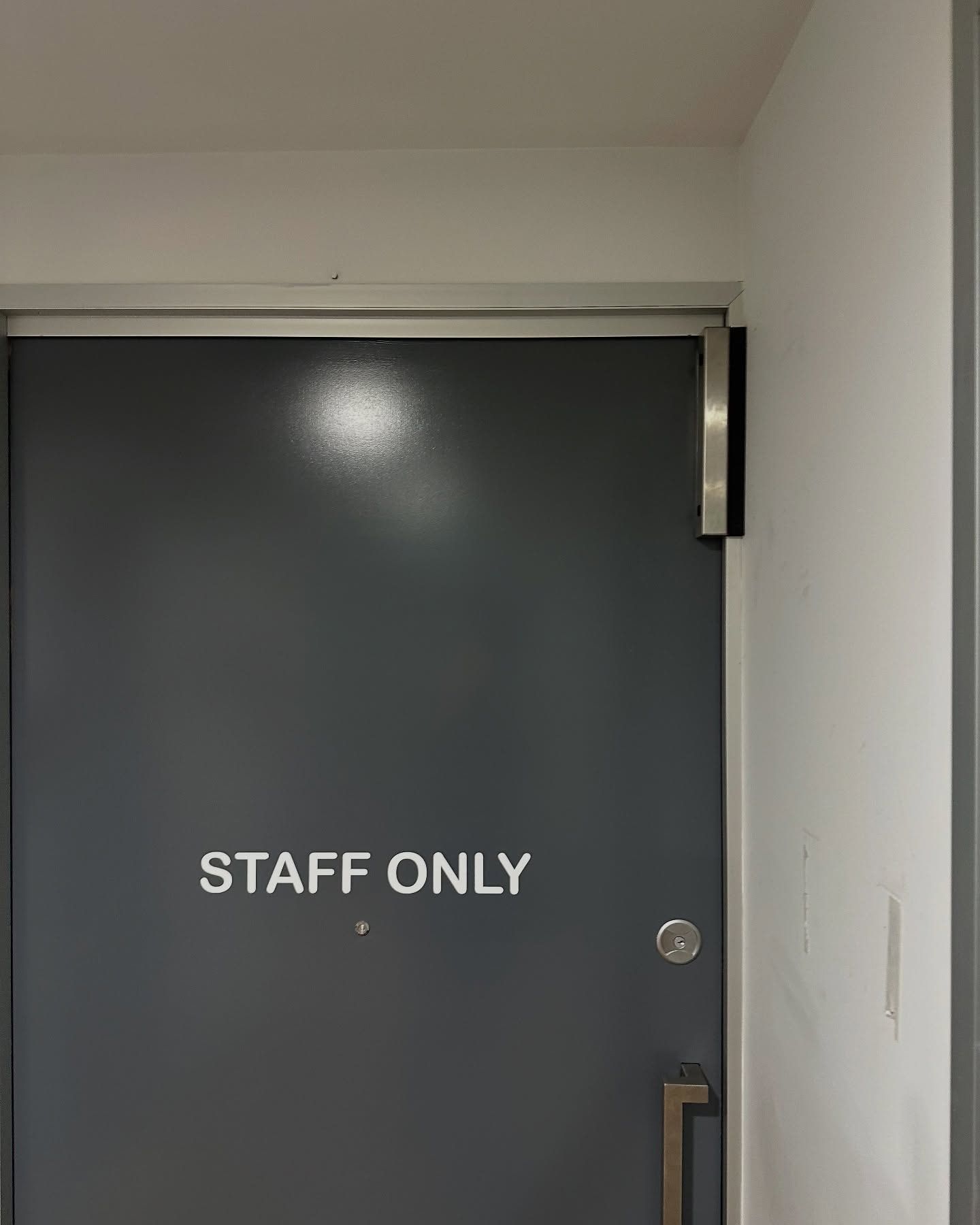 Grey Door With Staff Only Signage and a Door Lock — Great Ocean Locksmiths in Anglesea, VIC