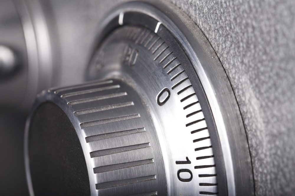 Close-up of a Safe Dial, Showing Numbers and Markings, Set in a Grey Metal Frame — Great Ocean Locksmiths in Torquay, VIC