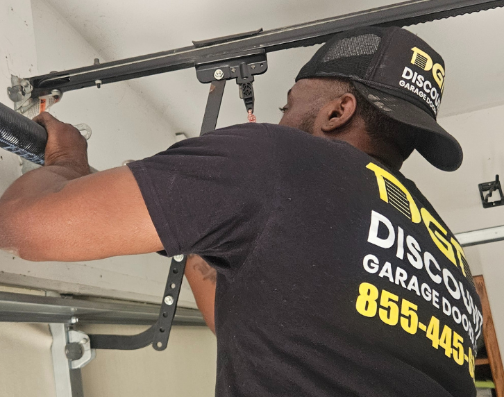 garage door tech fixing broken spring in moosic pa