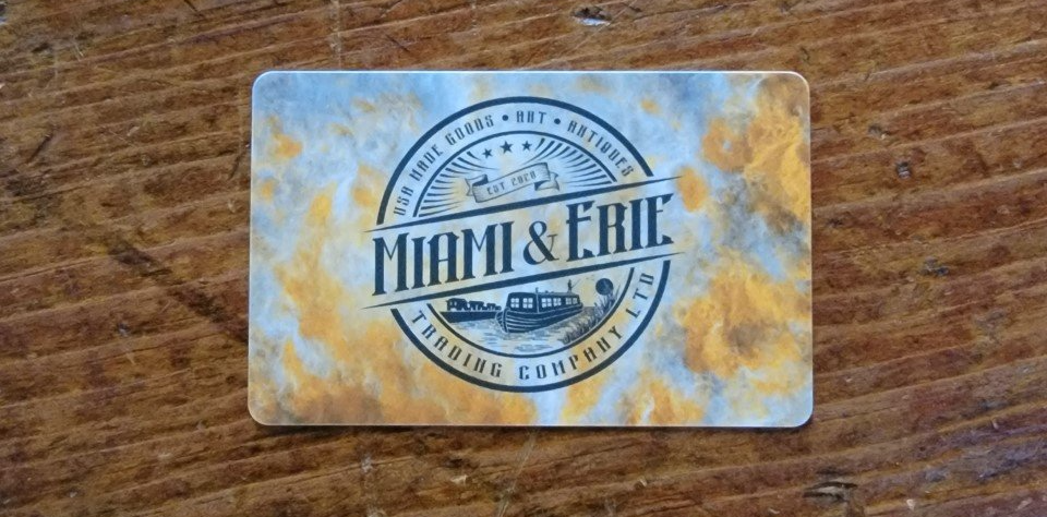 A worn card with the logo 