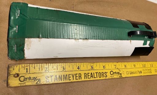 A yellow ruler that says century 21 stanmeyer realtors