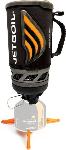 A jetboil pot is sitting on top of a stove.
