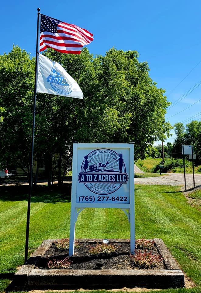 A to Z Acres sign with USA flag