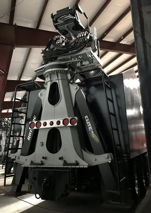 A large machine is sitting inside of a building.