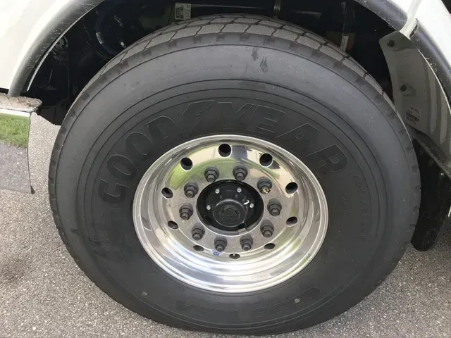A close up of a good year tire on a truck.
