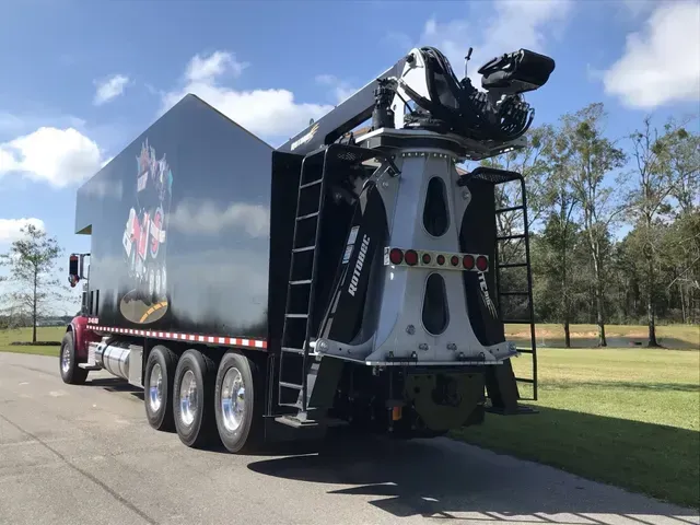 A large truck is parked on the side of the road