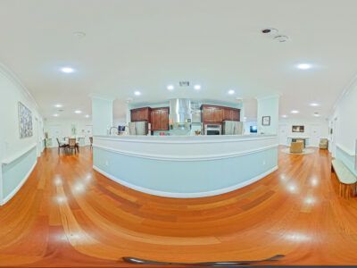 A 360 degree view of a kitchen and dining room in a nursing home.