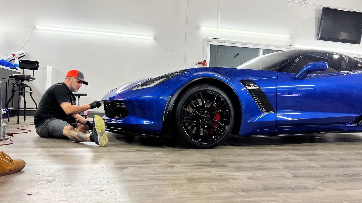 A Man Cleaning Car — Fort Myers, FL — Qool Window Tinting A Man Cleaning Car — Fort Myers, FL — Qool Window Tinting