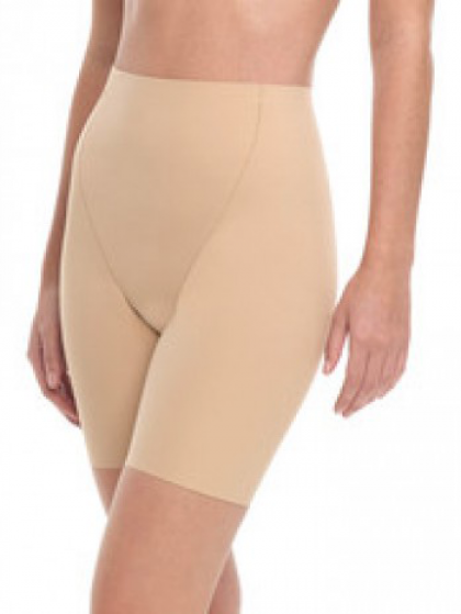 Woman wearing beige high-waisted compression shorts, smoothing the hips and thighs.