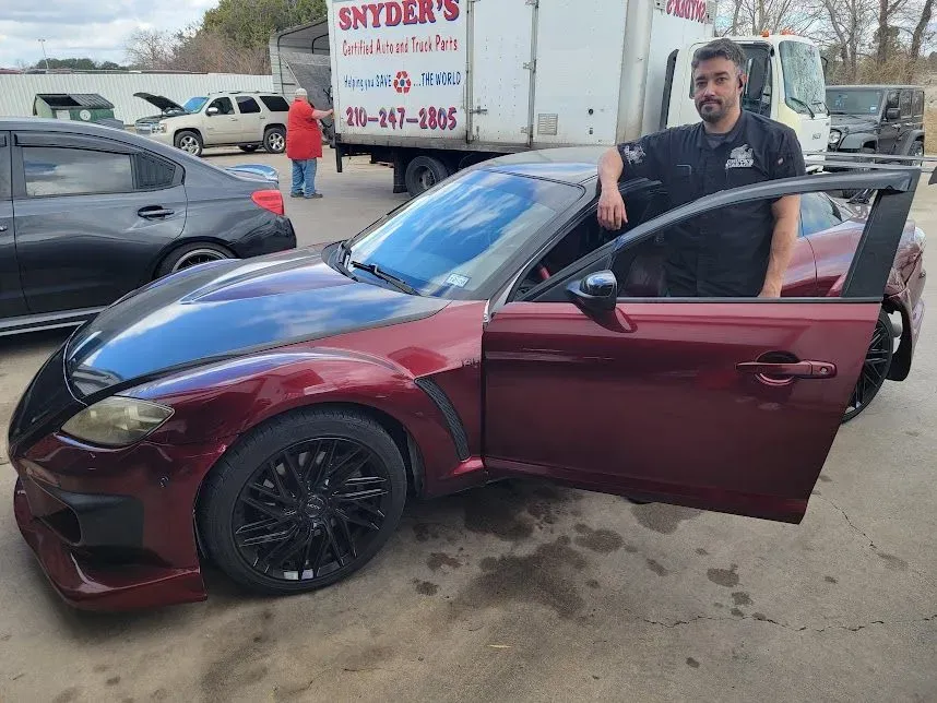 Red Mazda RX-8 parked at Chuck's Garage in Killeen, Texas. | Chuck's Garage