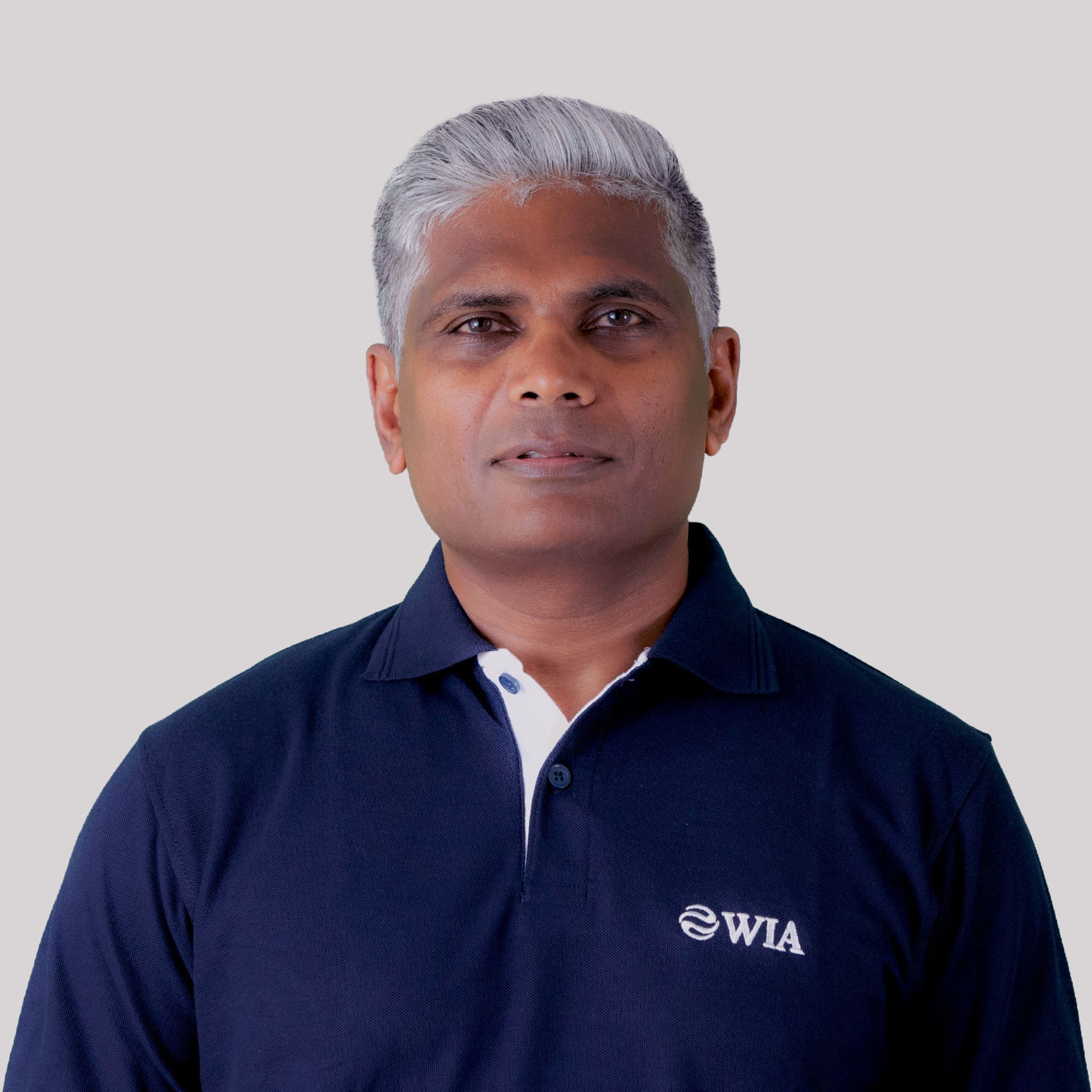 Portrait of Sujith Wimalasooriya, Co-Founder and President of WIA Systems