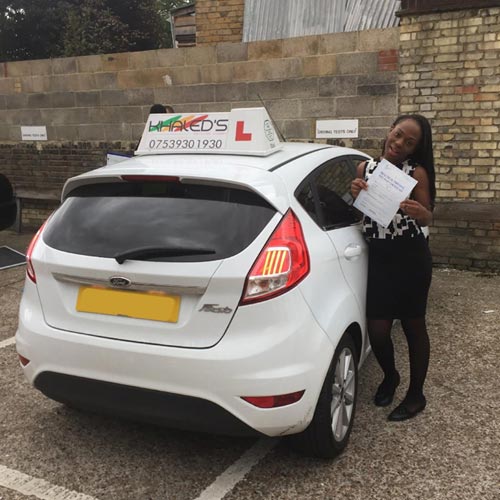Happy woman passing driving test