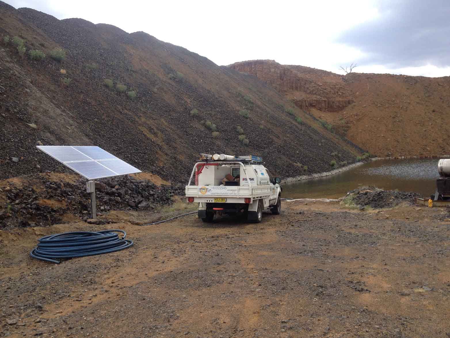 A Group of Solar Panels Are Sitting in a Field β Sapphire City Solar & Electrical In Inverell, NSW