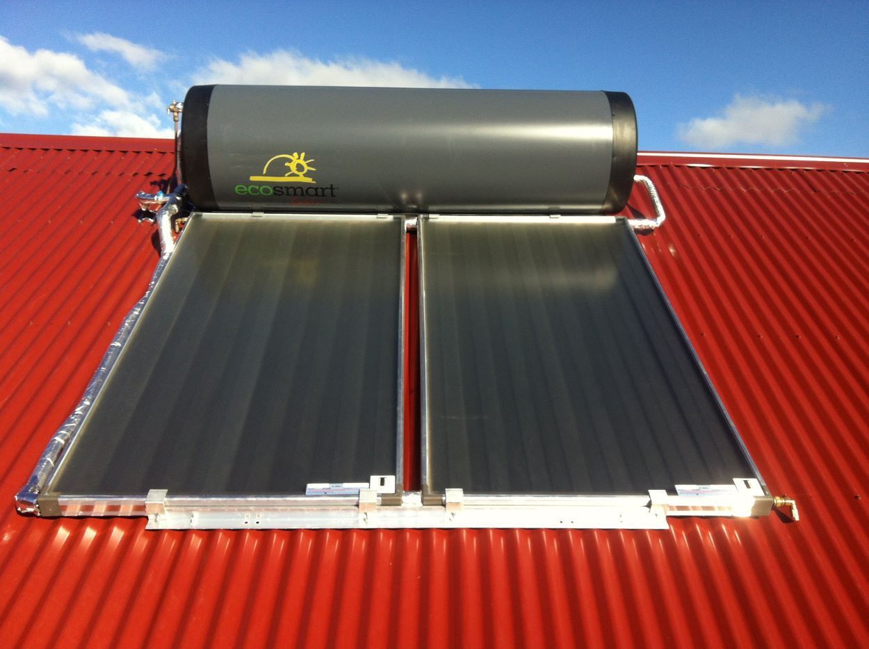 A Solar Water Heater is on a Red Roof — Sapphire City Solar & Electrical In Narrabri, NSW