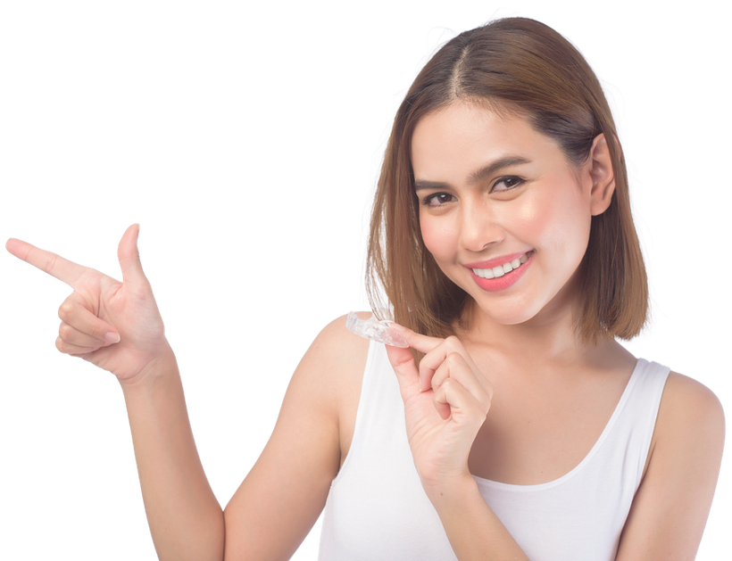 A woman is holding a clear brace and pointing.