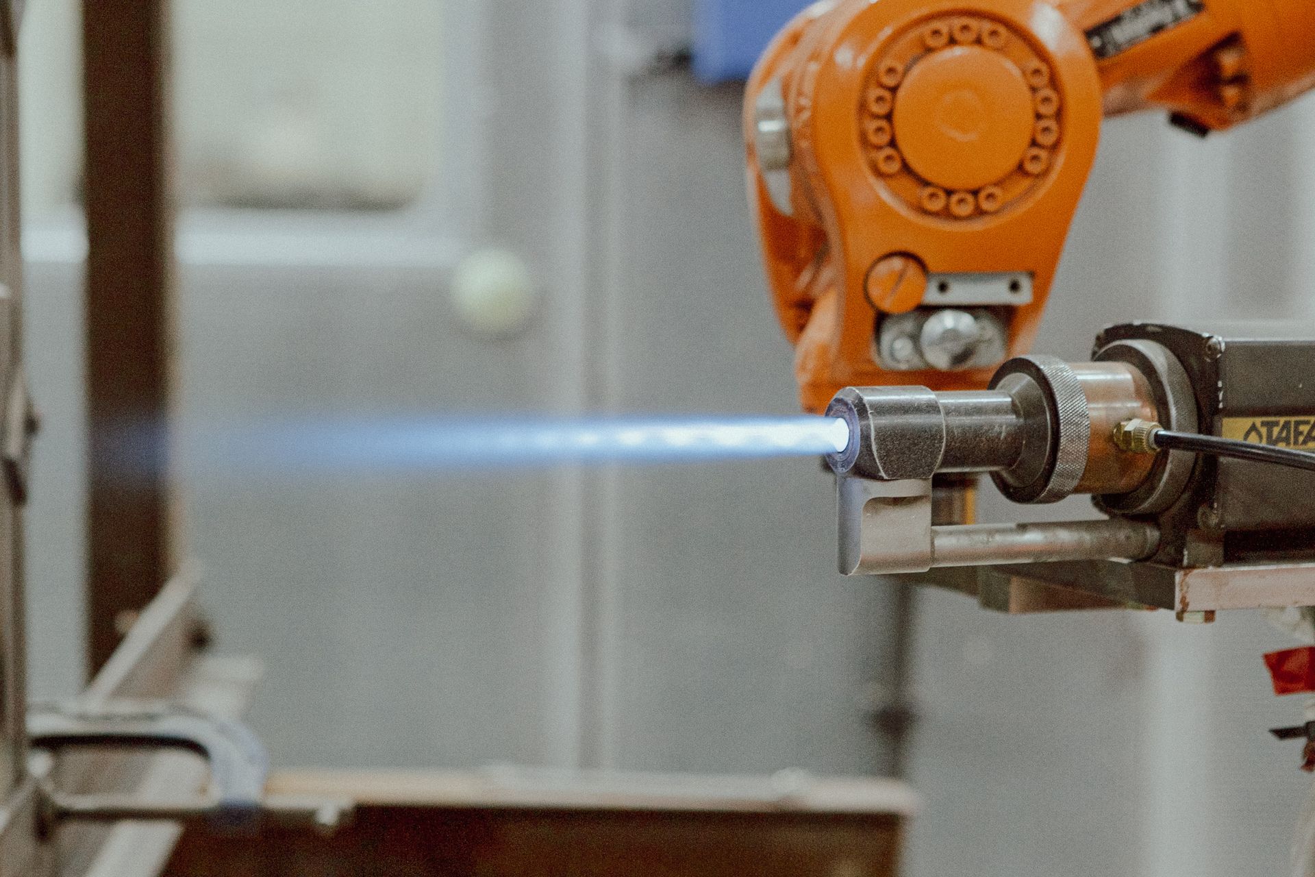 Thermal spray coating process at New Metal Surfaces.