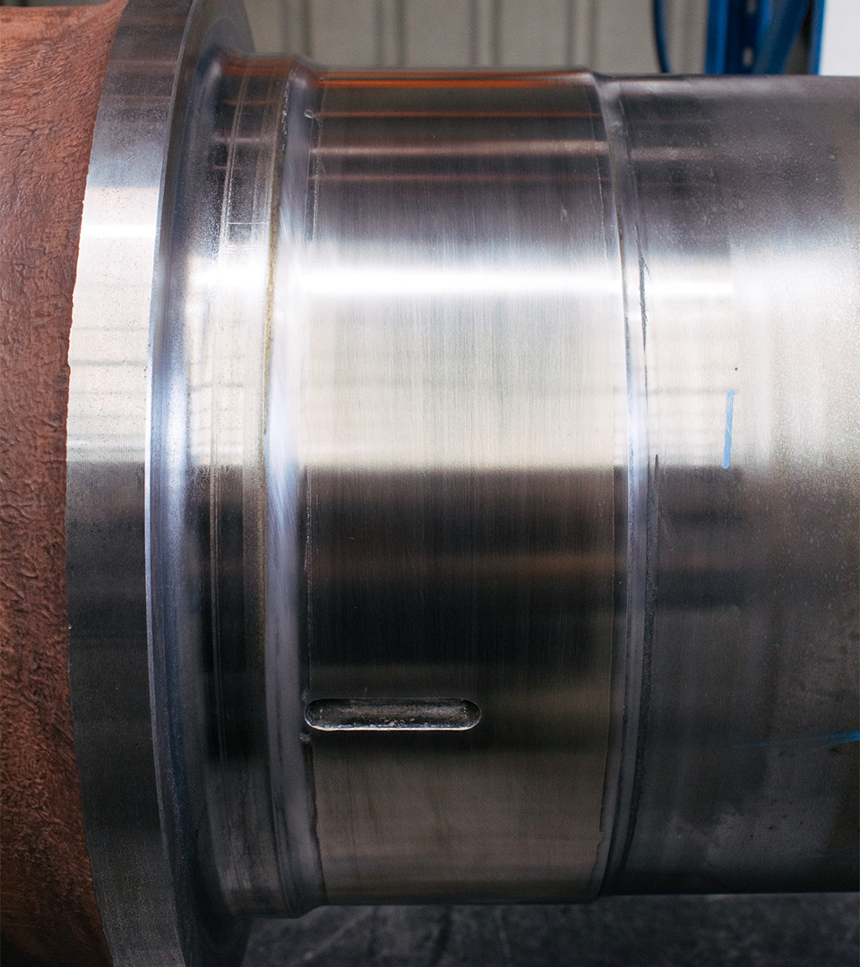 A close-up of an HD1500 Rear Axle being coated with metal at the New Metal Surfaces facility.