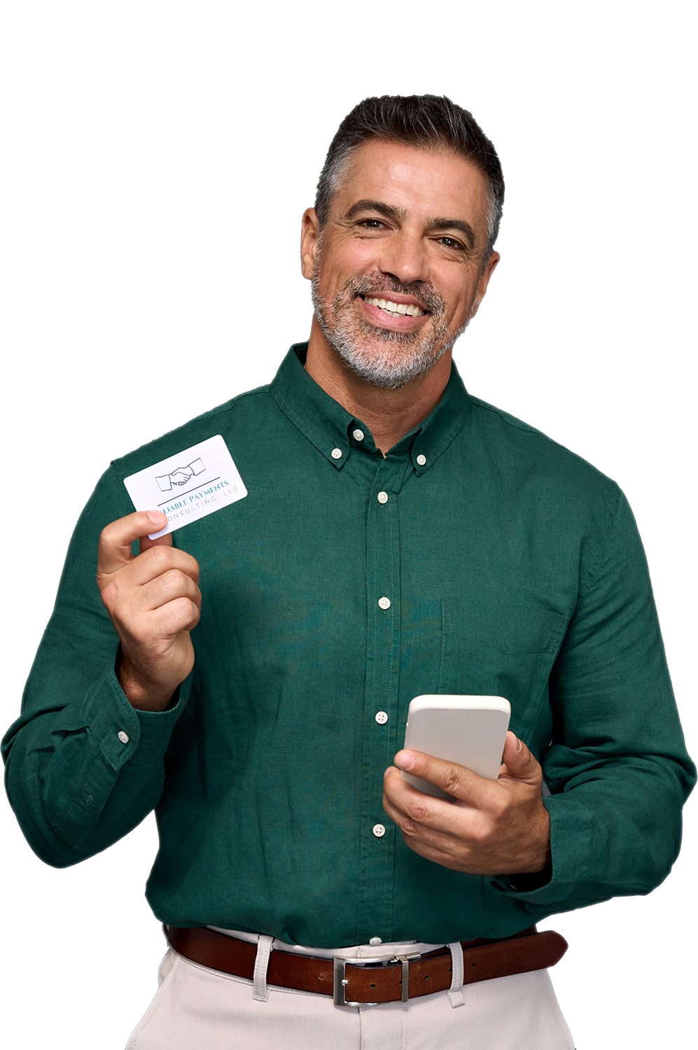 A man in a green shirt is holding a credit card and a cell phone.