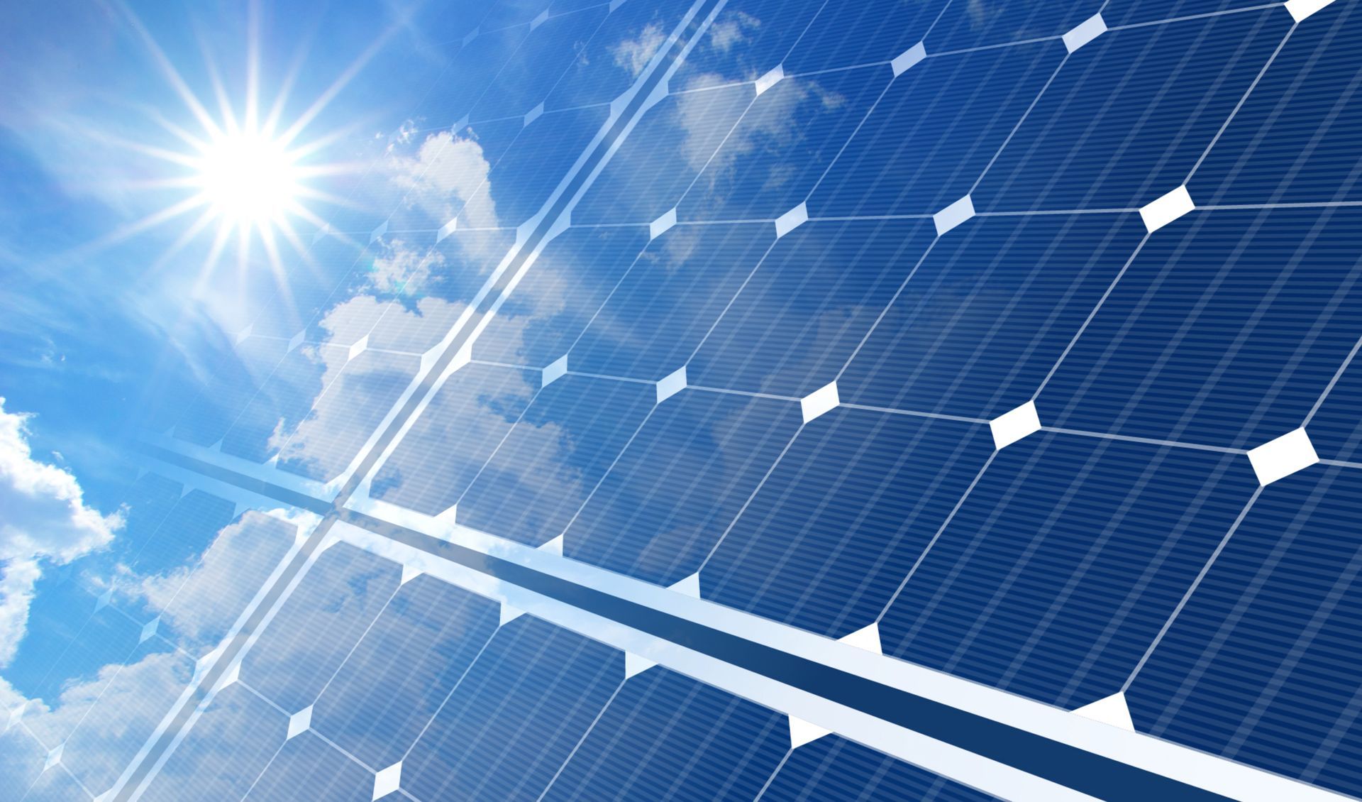 a close up of a solar panel with the sun shining through it