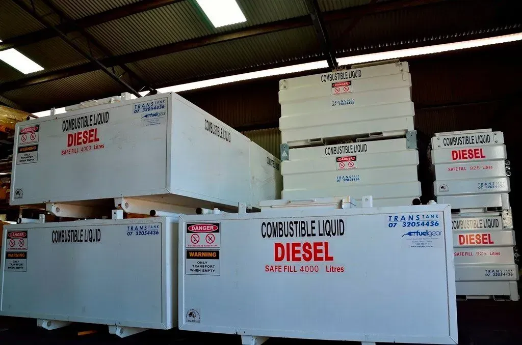 a bunch of diesel boxes are stacked on top of each other