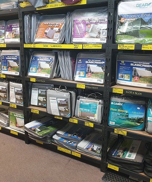 Row Of Shelves Filled With A Variety Of Camping Products — BTC Parts & Accessories In Pinelands, NT