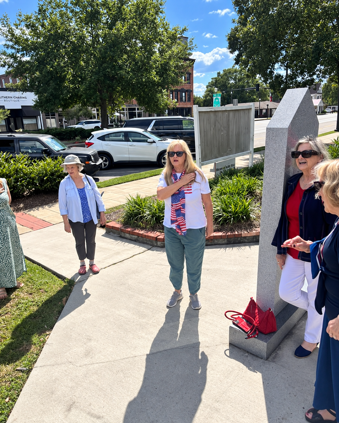 Community members gathering at Brooks County Courthouse for Bells Across America event