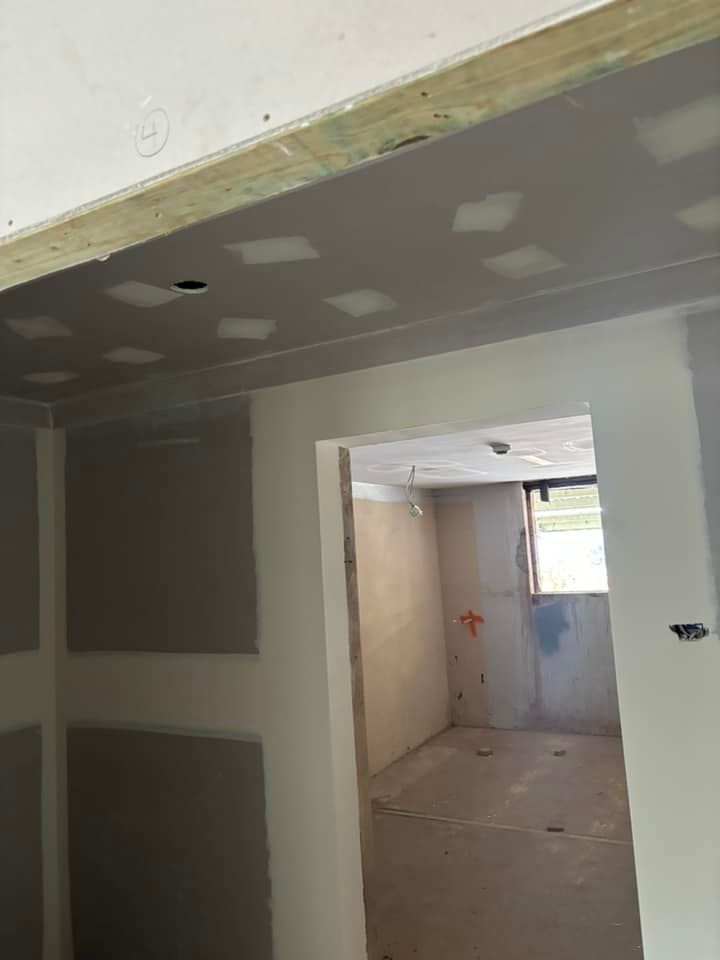 View Of A Residential Construction Site Showing Drywall Panels On Ceilings And Walls — HJK Plastering In South Lismore, NSW