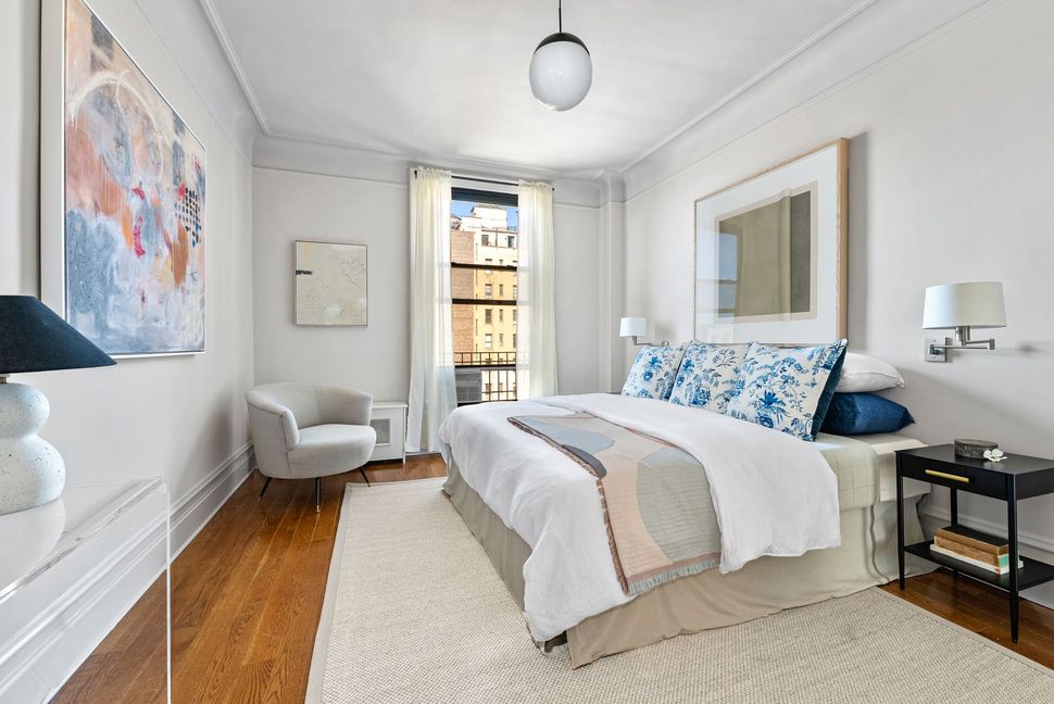 There is a large bed in the middle of the room.