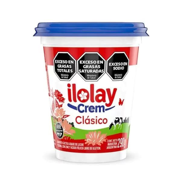 Envase Ilolay Crem Clásico, color rojo y blanco con tapa azul, advertencias nutricionales, producto lácteo.