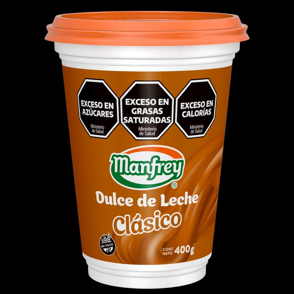 Envase de Dulce de Leche Clásico Manfrey, con etiquetas de advertencia, 400g, color marrón y naranja.