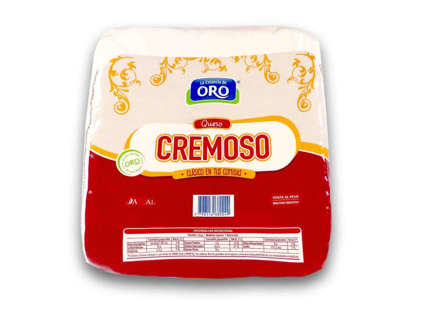 Un bloque de queso cremoso “Oro” en empaque rojo y blanco.