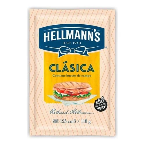 Paquete de mayonesa Hellmann's Clásica, con ilustración de un sándwich sobre fondo amarillo.