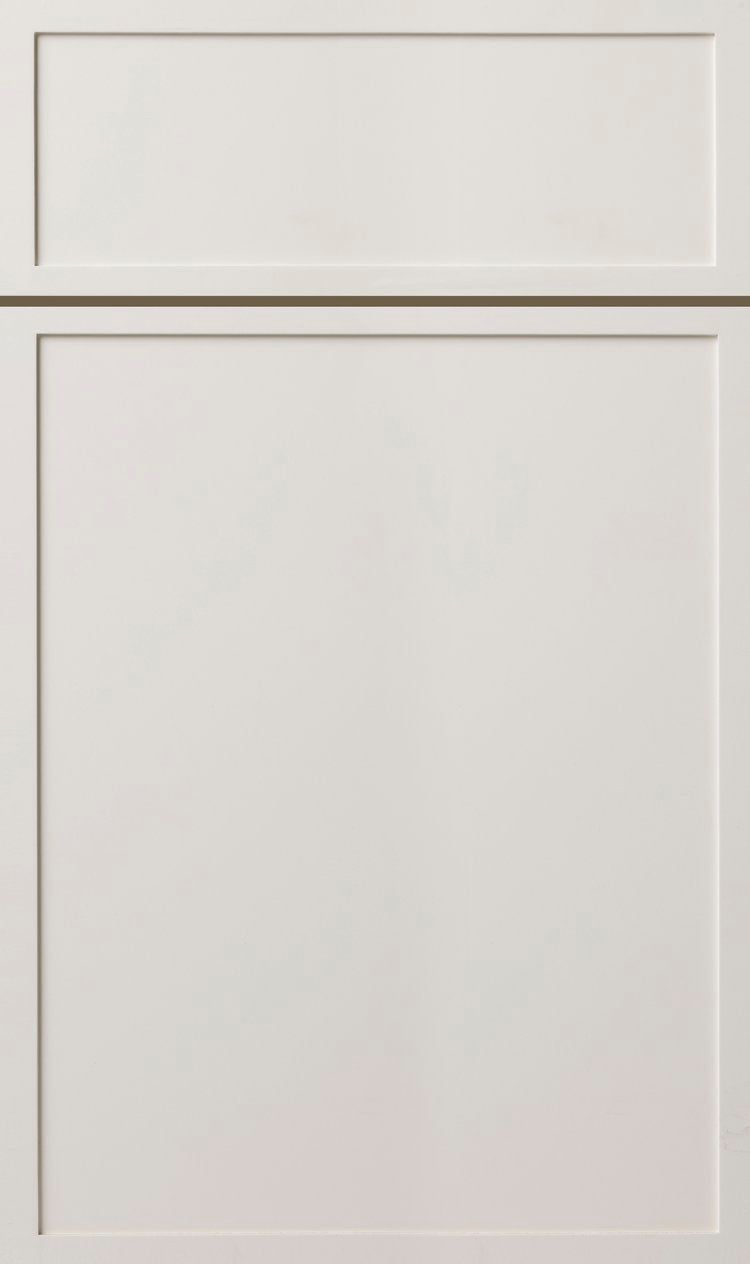 White paneled cabinet doors with a small upper drawer and a larger lower door.