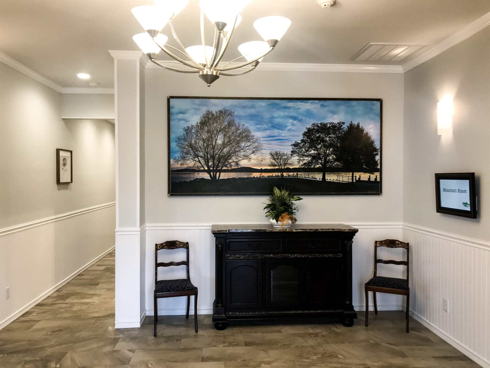 funeral home facility grand foyer with black cabinet