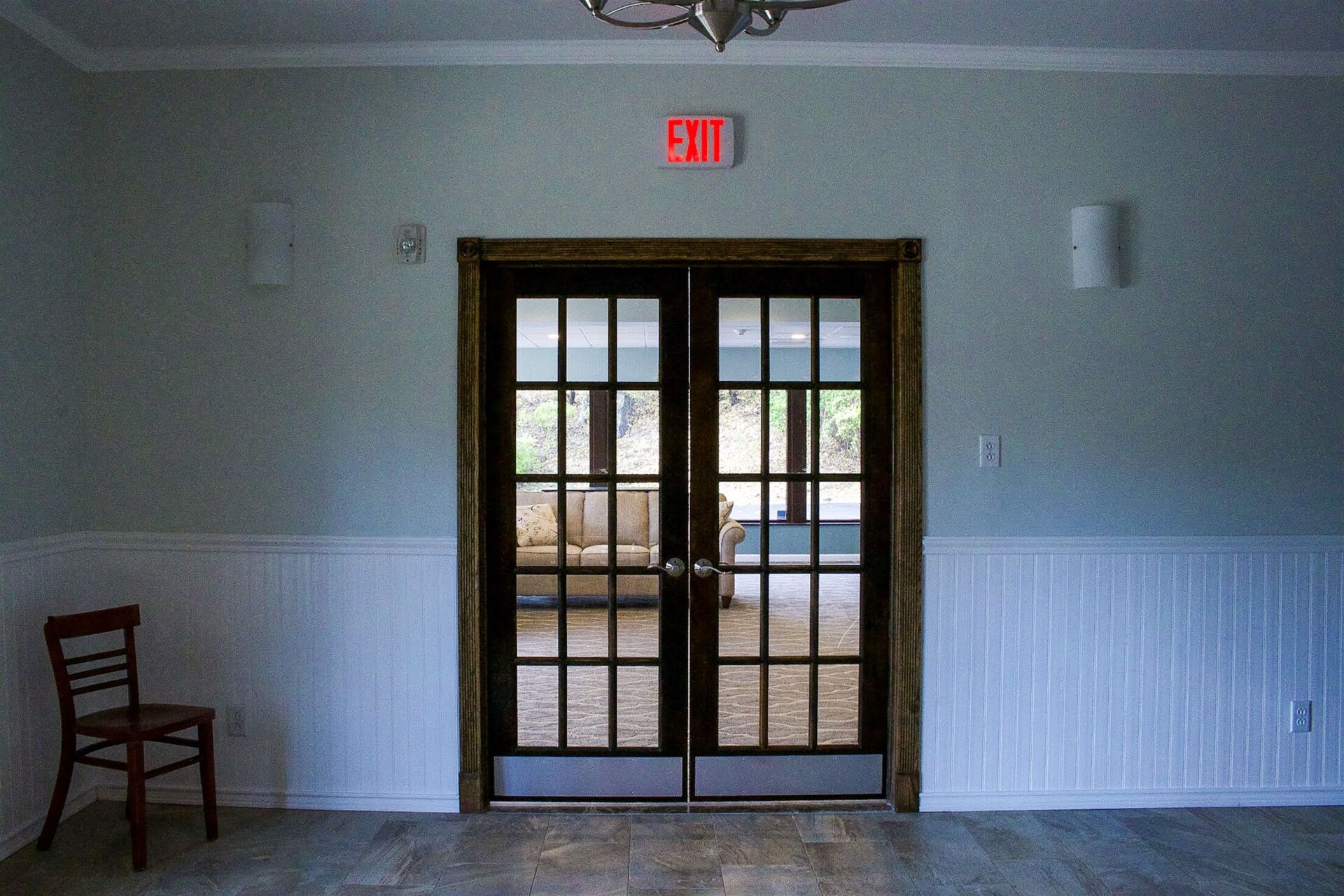 funeral home facility room with exit door