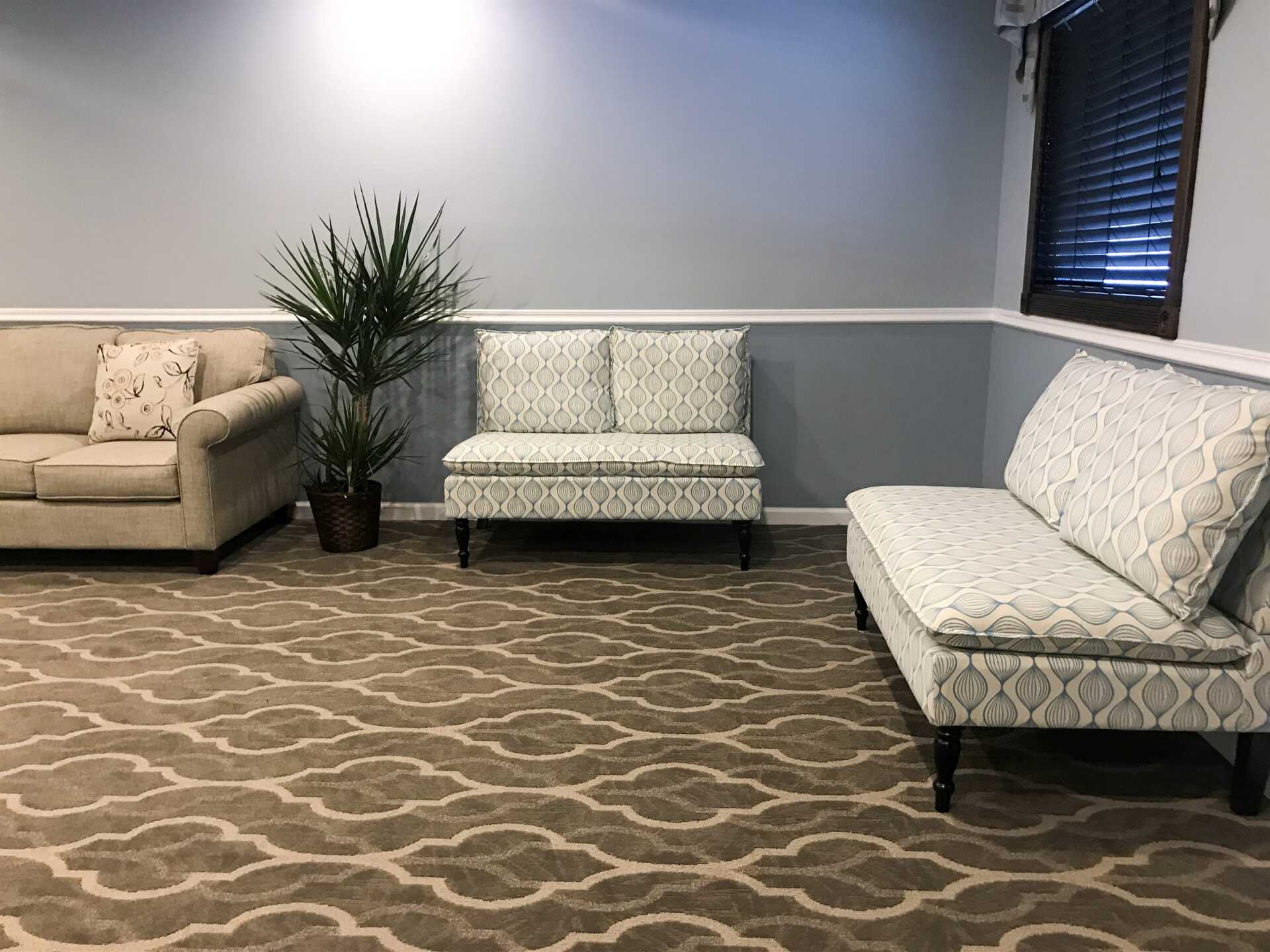 funeral home facility mountain room white chairs