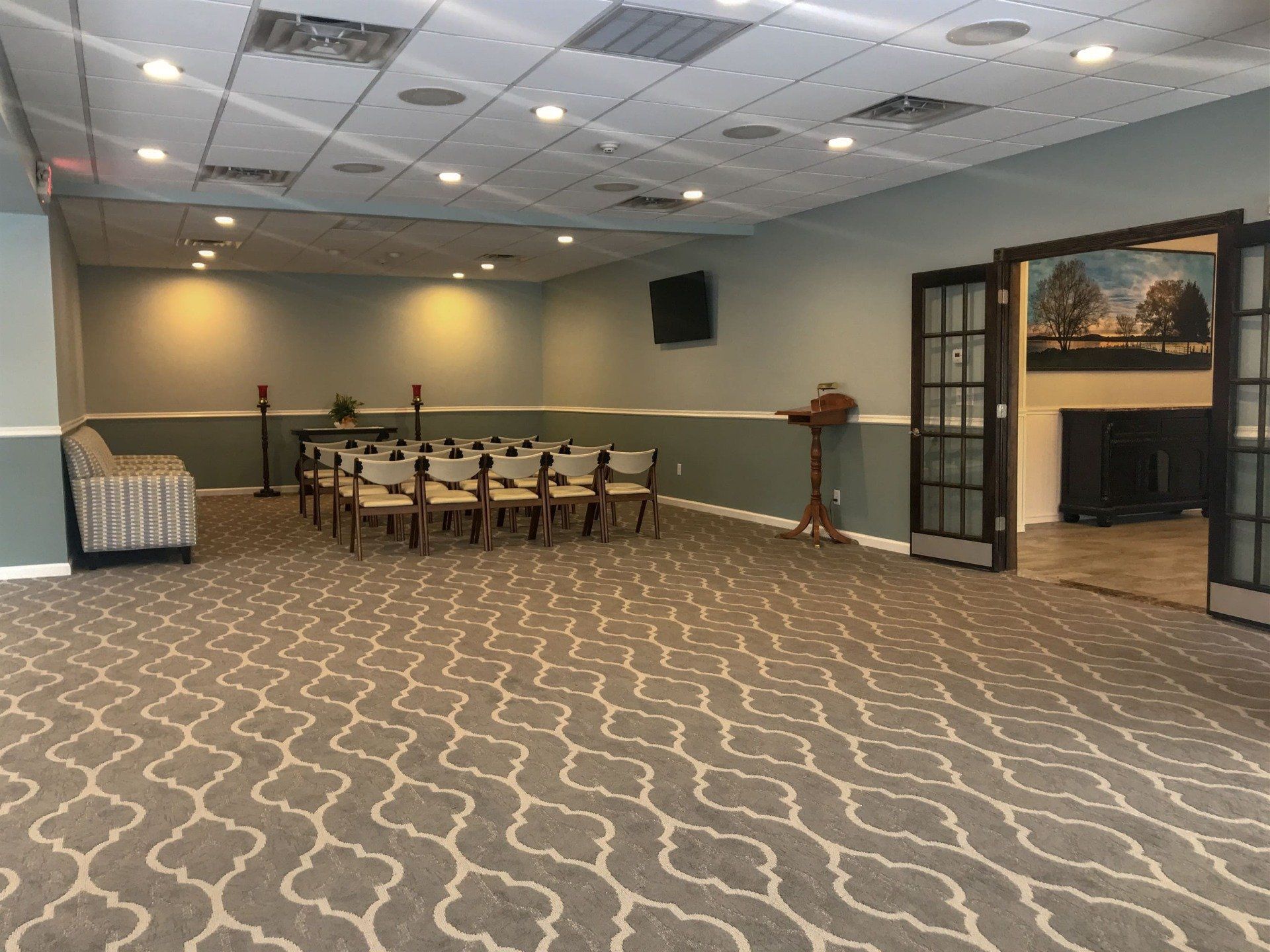 funeral home facility river room with chairs