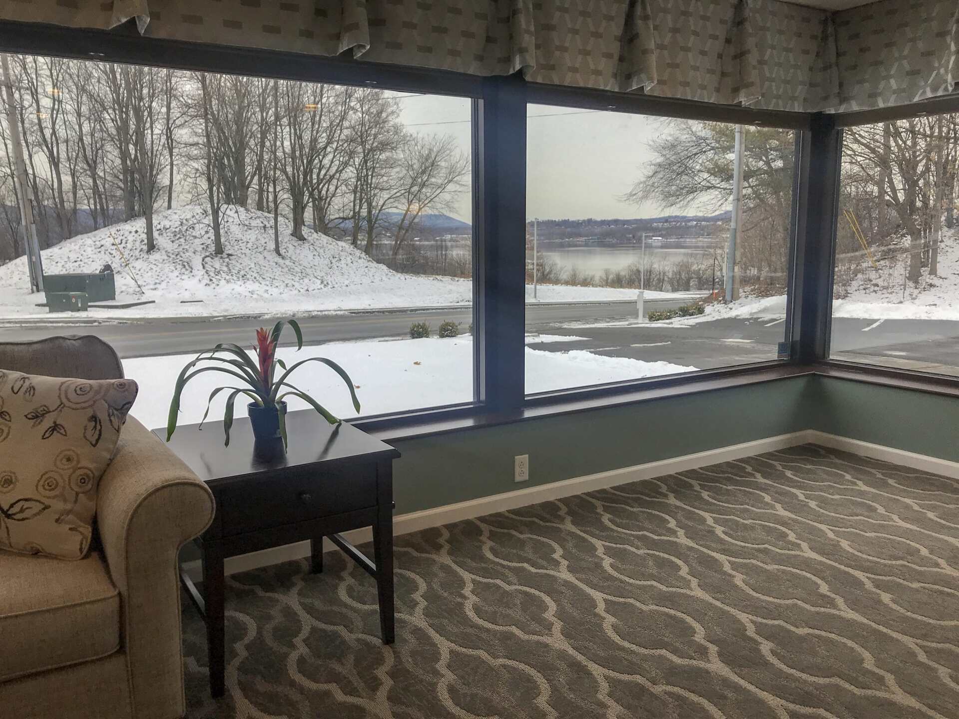 funeral home facility room with windows and furniture