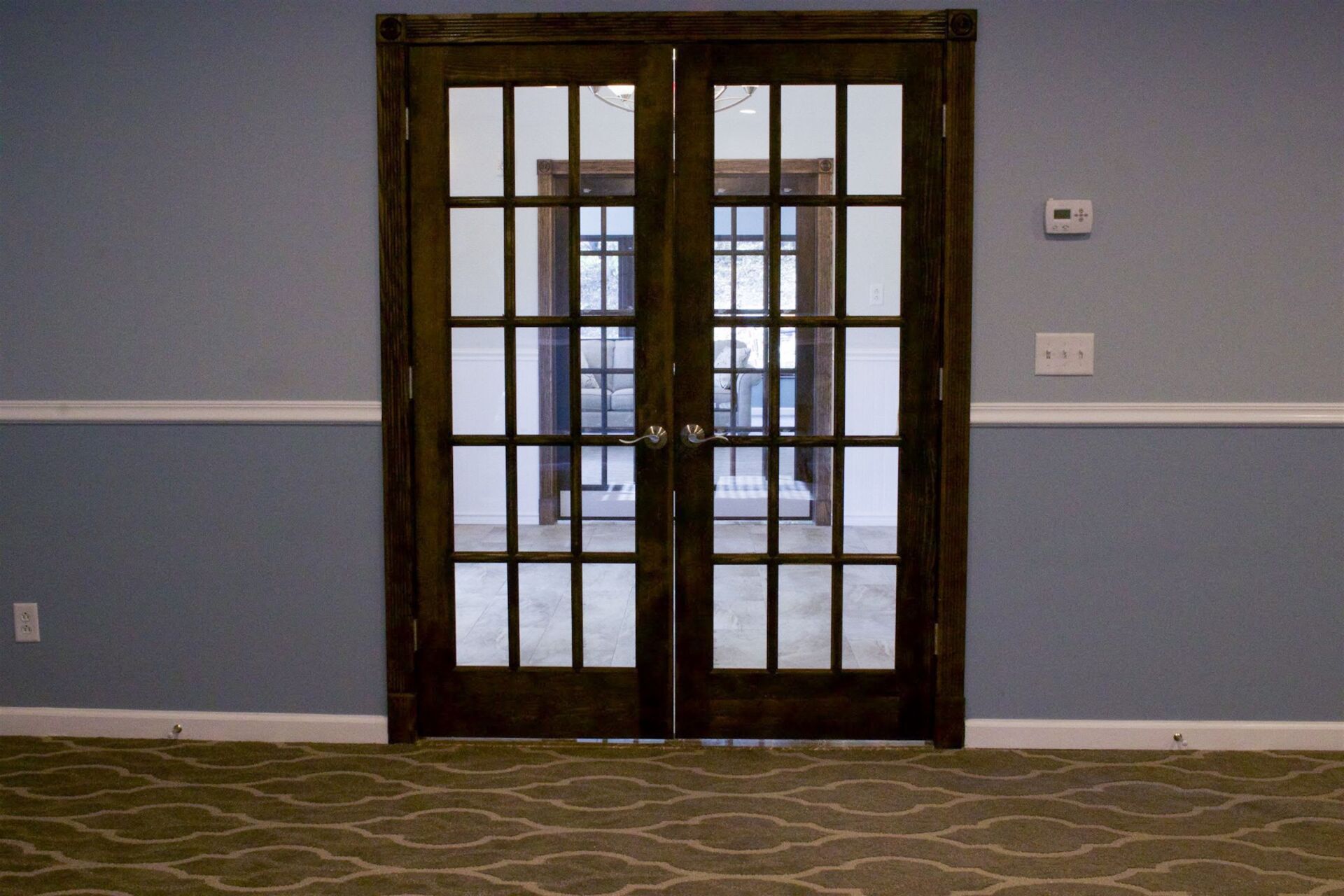 funeral home facility mountain room wooden door